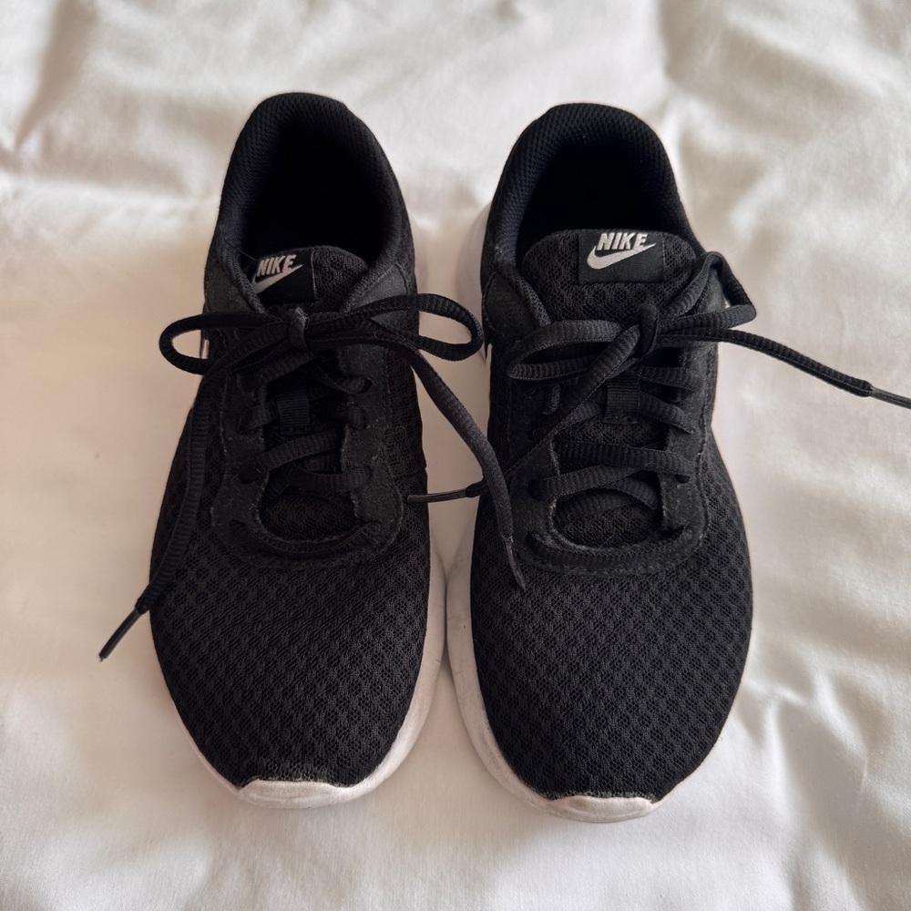 Nike Dark Gray Knit Slip-On Sneakers with White Tag Accents